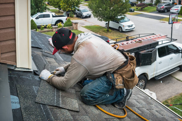 Professional Roofing technician working in Oakland, ME